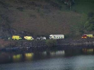Supporting image for story: Holiday tragedy as car plunges into reservoir