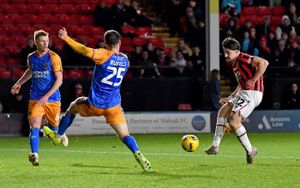 Shrewsbury came under intense pressure as Walsall's Jamie Jellis went for goal