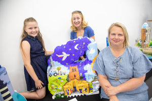 Rupert's sister Madeleine, his aunt Liz and artists Deborah Meredith with the sculpture