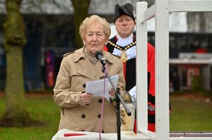 Auschwitz survivor Mindu Hornick MBE speaks at the service and lays a symbolic stone on the memorial.