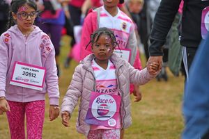 This young runner was having a great time despite the rain