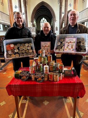 The new Tin Bank will be open to anyone who requires help. Churchwarden Carl Carlson, Rector, Father Tim Williams and Assistant Curate, Fatherr James Homer, are pictured with a few of the tins for the tin bank.