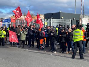 Police officers on hand as members of Unite go on the picket line at Birmingham City Council's Atlas Depot in Tyseley, Birmingham.