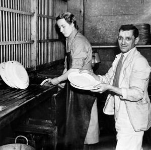 The men helped with the washing up.