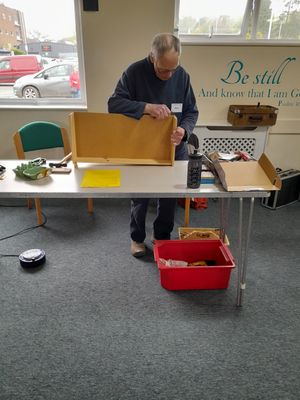David Currant repairing drawer