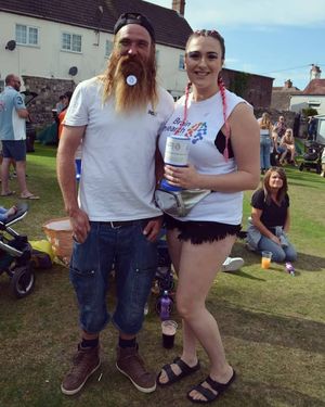 Abbie with Andrew Lane, who had his flowing locks shaved for the charity appeal