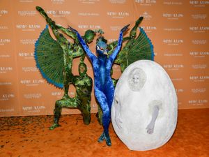 Supporting image for story: Queen of Halloween Heidi Klum recruits acrobats for peacock costume