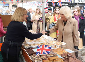 Queen Camilla meets another trader. 