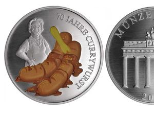 Supporting image for story: A German mint has made a currywurst coin and online reaction has been… mixed