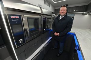 Nathan Hadley, MD of Prospect Coaches in Lye, in the luxurious coach that transports West Bromwich Albion's first team - which boasts its own kitchen with two Rational ovens and a top quality microwave. Stats show players can improve on pitch performance by 10 per cent if they get the right nutrition and food after a game