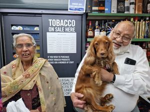 Gurdas and Meeto with their beloved Cocker Spaniel, Poppy, aged three.