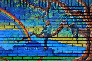 Artist Rory McCann's mural at Brown Clee Primary School