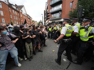 Supporting image for story: Demonstrators detained by police during rival protests outside asylum hotel