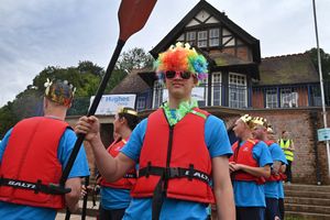 Harrison Craister brings disco style to proceedings at the dragon boat festival