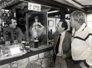 Customers at the Old Mill in Ruiton, Gornal, found themselves scratching their heads in September 1978 when confronted by this eerie picture given to licensee Mrs Pat Green by a woman who claimed that a patch on the dress in the Gainsborough print changed from green to red and then brown. Mrs Green's husband John had a close look at the picture with Pat Quinn, centre, and John Guest.