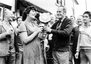  Mr Brian Hutton, right, licensee of the Cross Inn at Oldswinford, with the trophy won by the pub team in the September 1981 river raft race between Bridgnorth and Bewdley. Rival Mrs Joan Kelly of the Holly Bush had disputed the win, saying the Cross craft was actually a canoe, but conceded the point, for that year at least. 