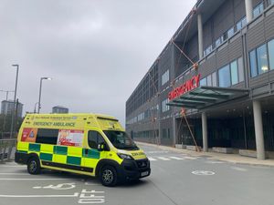 An ambulance outside the entrance to the new soon-to-open Midland Metropolitan University Hospital in Smethwick. Pic: LDRS. Permission for reuse for all LDRS partners.