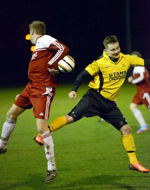 Ellesmere's George Durrell and Wem's Christian Oldham
Elesmere in yellow