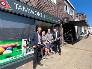 Sir Gavin Williamson with staff at Tamworth Cues in Codsall