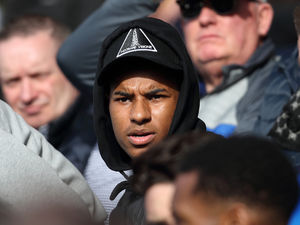 Supporting image for story: Injured England star Marcus Rashford in crowd to cheer on Shrewsbury Town pal