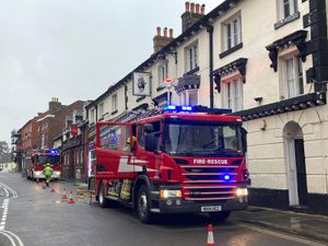 Firefighters outside the Black Lion Hotel in Ellesmere