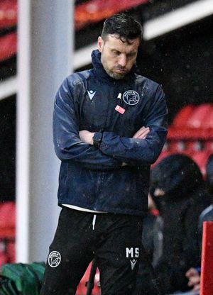 A dejected Walsall manager Mat Sadler