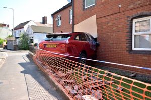 The Jaguar car crashed into a house on Cyril Hayward Court in Hadley on Saturday, July 12