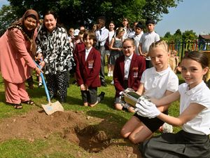 Supporting image for story: School buries lasting monument to school for future generations to view