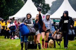 Supporting image for story: V Festival gates open: See PICTURES and VIDEO as thousands arrive at a damp Weston Park
