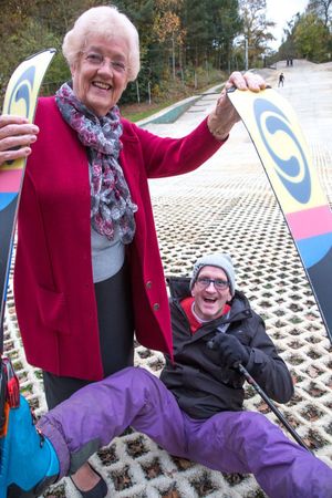 Telford & Wrekin Councillor Hilda Rhodes with Eddie "The Eagle" Edwards at Telford Snowboard and Ski Centre in Madeley