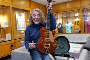 The guitar features the signature of the legendary guitarist, who was born and raised in West Bromwich