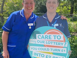 Nurse at Severn Hospice, Abi White (left) with the life-size cut-out. 