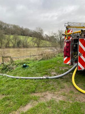 Water being pumped from the River Severn to deal with the fire.