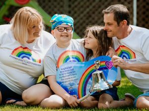 Supporting image for story: Katie, 9, rings the bell against cancer