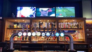 Drinks and screens at Pitchers