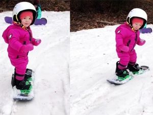 Supporting image for story: This cute toddler is already an impressive snowboarder at the age of two