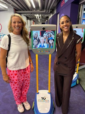 The Bridgnorth Spartans players met Rachel Brown-Finnis (left) and Alex Scott through the robot