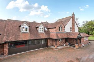 The home features several outbuildings including a secure workshop, bespoke full-height garage, additional garages, a three-bay open barn, wood store, and a large open bay store. Pic: Fine & Country/Rightmove