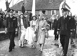 October 1946: Princess Elizabeth is second left with Prince Philip (then Lieutenant Philip Mountbatten RN) on the right. The occasion is the wedding of the Hon Patricia Mountbatten at Romsey, Hampshire. Others pictured are the princess’s parents, King George VI and Queen Elizabeth, and her sister Princess Margaret.