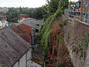 Supporting image for story: Families flee wall danger