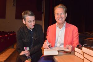 Michael Portillo signing one of his books for fan David Ravenscroft