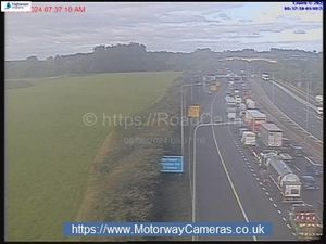 Supporting image for story: Three people including child checked over by paramedics after three-vehicle crash on M5