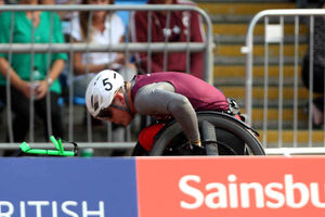 Ben Rowlings in action during the 100m Wheelchair Boys at the Sainsbury's 2014 School Games.