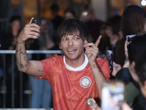 Supporting image for story: Louis Tomlinson ‘expecting a few texts’ from One Direction after new album launch