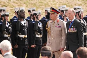 King Charles III  during the national Service of Remembrance, hosted by the Royal British Legion in partnership with the Government, to mark the 80th Anniversary of VJ Day at the National Memorial Arboretum in Alrewas, Staffordshire. Picture date: Friday August 15, 2025. PA Photo. Photo credit should read: Aaron Chown/PA Wire 