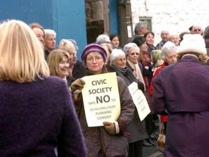 Supporting image for story: Protesters win home battle