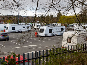 Supporting image for story: Groups of travellers move on after setting up camps on park and near supermarkets