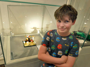 Cal Adlard with his model Mount Vesuvius eruption and the destruction of Pompeii. Cal was winner of the 12-16 Category in competition  