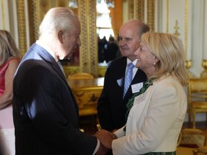 Alistair and Heather James meet the King