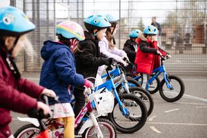 Youngsters taking part in a children's cycling training session with Instructor Nick Jenko.